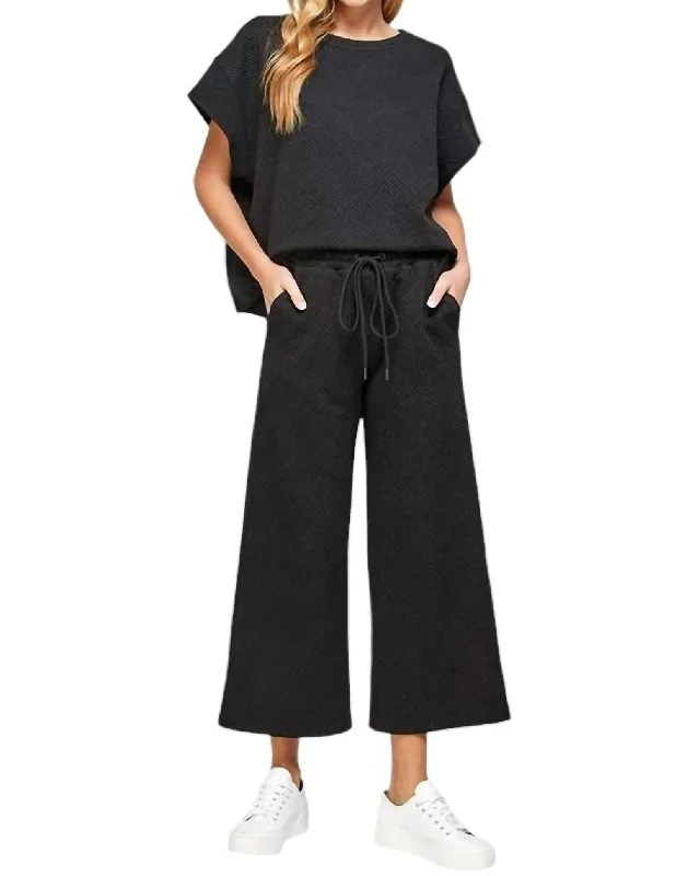 Plus Size Women's Stretch Cotton Tight Trousers in Navy for Comfortable Everyday WearTextured Short Sleeve And Cropped Flare Pant Set In Black Plus Size Women's Stretch Cotton Tight Trousers in Navy for Comfortable Everyday WearTextured Short Sleeve And Cropped Flare Pant Set In Black